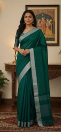Rama green linen cotton saree with silver zari border