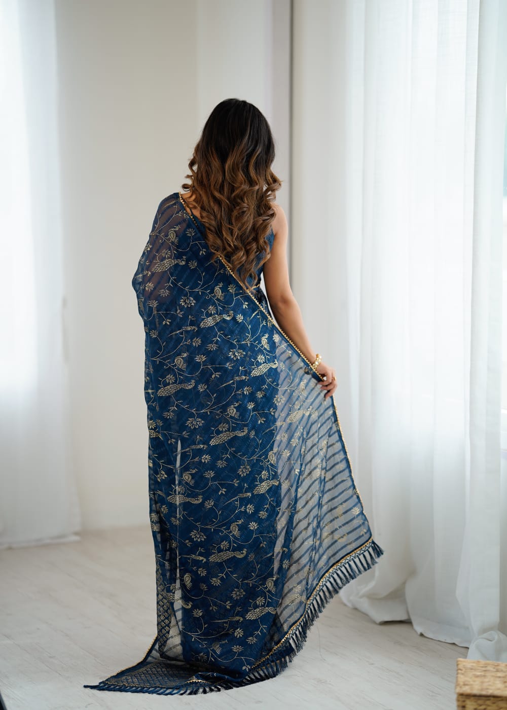 Navy blue color georgette saree with digital printed work and lace border