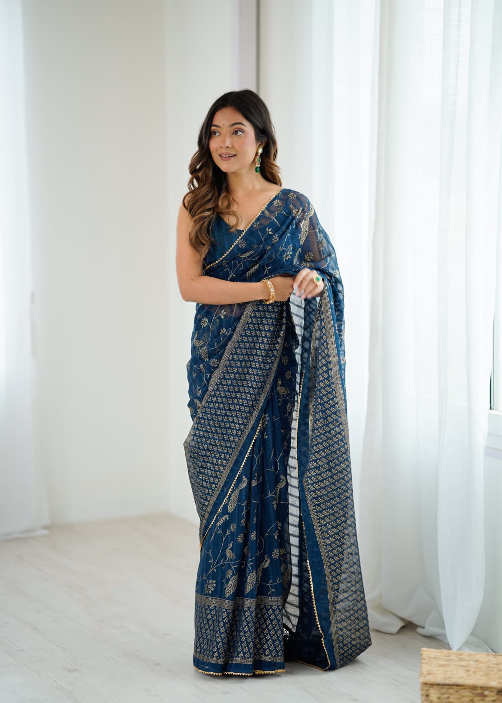 Navy blue color georgette saree with digital printed work and lace border